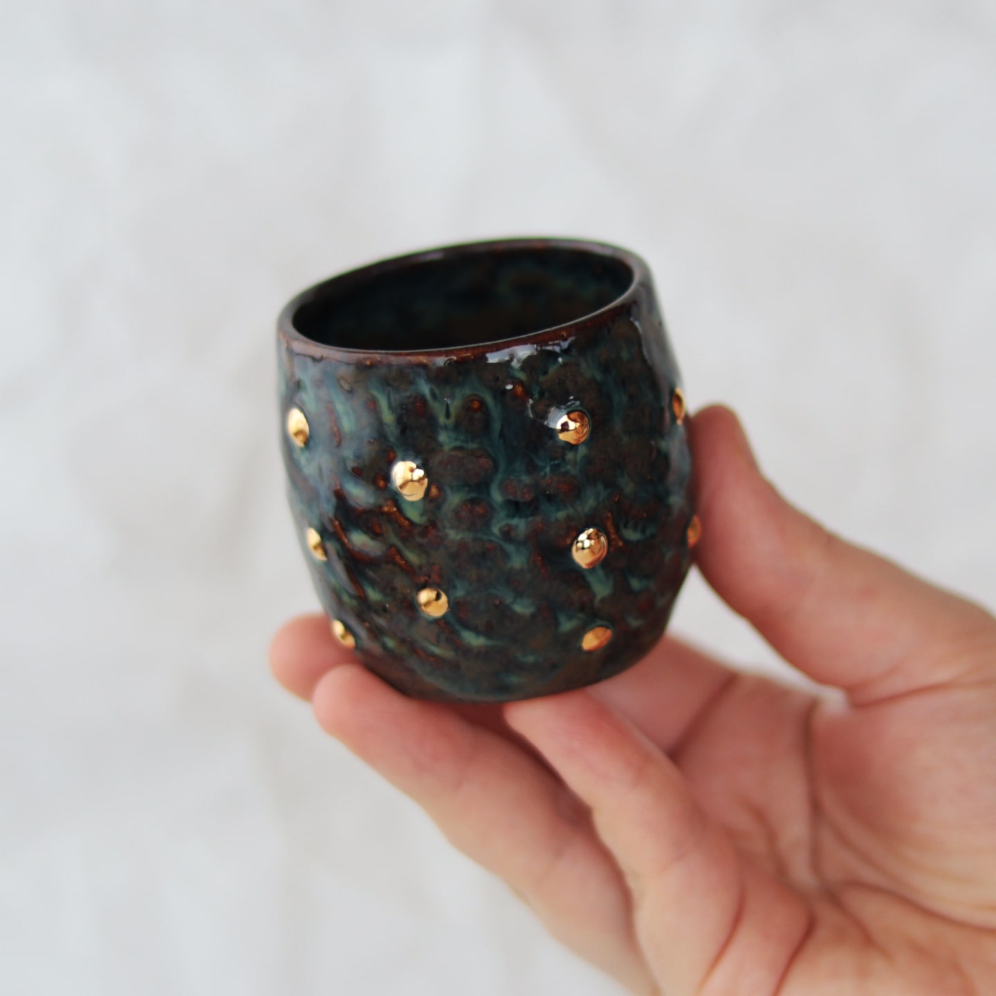 espresso-cup-with-gold-polka-dots-dark-held espresso-cup-with-gold-polka-dots-dark-held