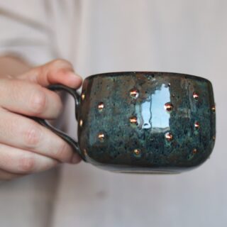 mug-with-gold-polka-dots-dark-held